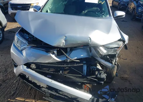 2016 Toyota Rav4 Hybrid Xle z USA, uszkodzony, nr VIN JTMRJREV2GD031248